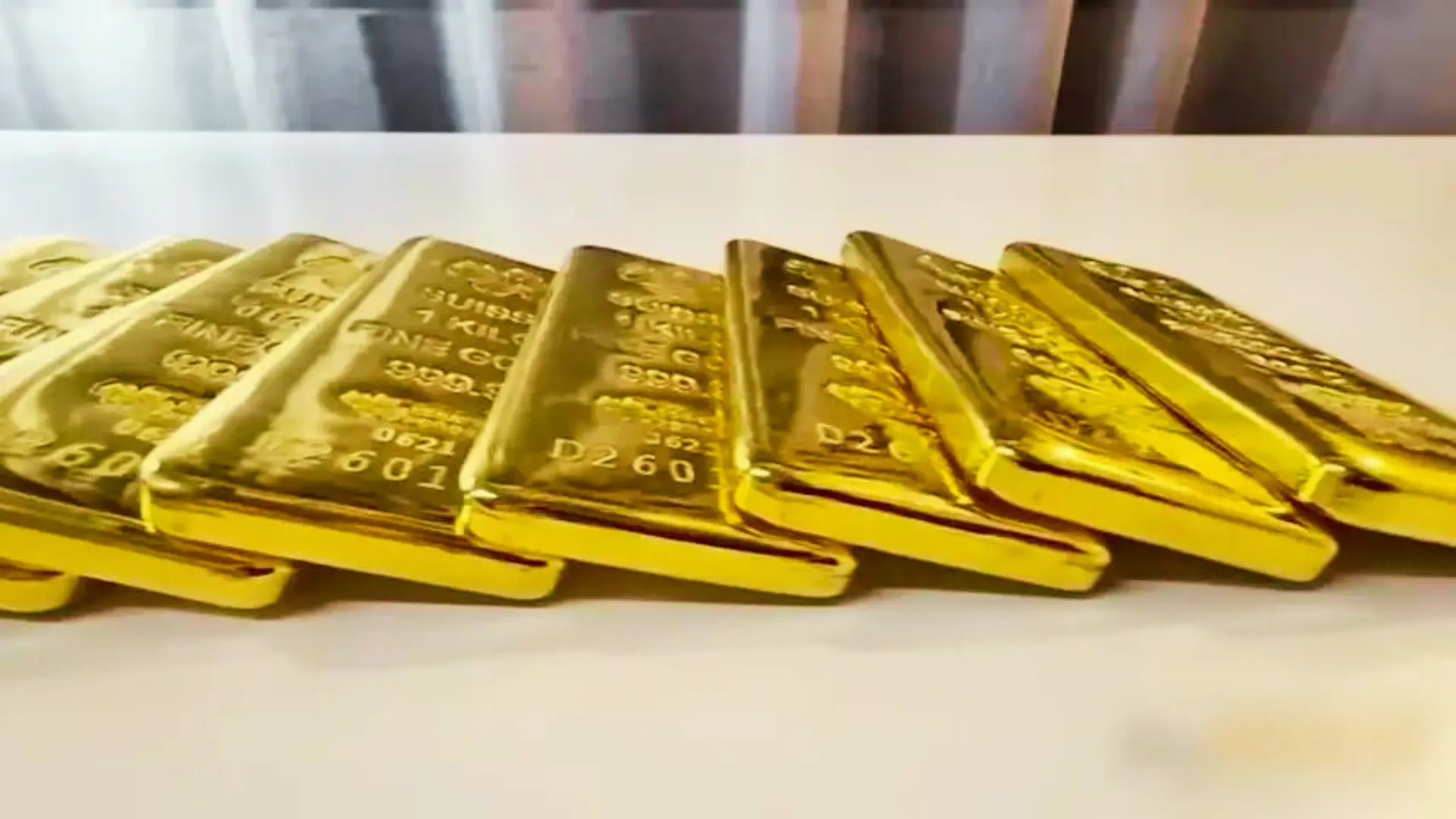 How To Start Gold Investment In Pakistan There are seven pure gold bars 24- karat used for the investment in Pakistan, stamped with 999.9, laying on the white table.